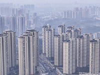 A photo taken in Huai'an, China, on November 12, 2024, shows residential buildings in the urban area of Huai'an City, East China's Jiangsu p...