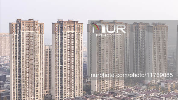 A photo taken in Huai'an, China, on November 12, 2024, shows residential buildings in the urban area of Huai'an City, East China's Jiangsu p...