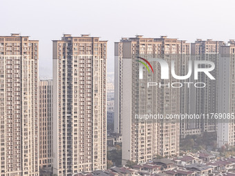 A photo taken in Huai'an, China, on November 12, 2024, shows residential buildings in the urban area of Huai'an City, East China's Jiangsu p...