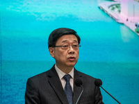 Hong Kong Chief Executive John Lee speaks to the media before his Executive Council meeting in Hong Kong on November 12, 2024. (