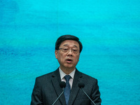 Hong Kong Chief Executive John Lee speaks to the media before his Executive Council meeting in Hong Kong on November 12, 2024. (