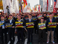 In front of the National Assembly in Yeouido, lawmakers, including Jin Sung-joon from the Democratic Party of Korea (center) and other membe...