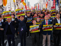 In front of the National Assembly in Yeouido, lawmakers, including Jin Sung-joon from the Democratic Party of Korea (center) and other membe...