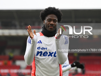 Ola Aina of Nottingham Forest warms up ahead of kick-off during the Premier League match between Nottingham Forest and Newcastle United at t...