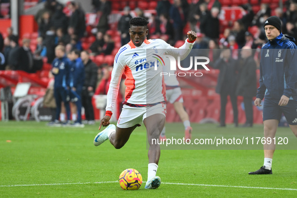 Taiwo Awoniyi of Nottingham Forest warms up ahead of kick-off during the Premier League match between Nottingham Forest and Newcastle United...