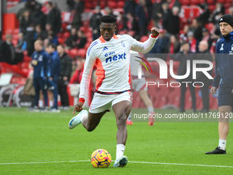 Taiwo Awoniyi of Nottingham Forest warms up ahead of kick-off during the Premier League match between Nottingham Forest and Newcastle United...