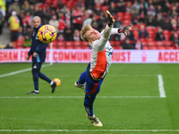 Aaron Bott of Nottingham Forest warms up ahead of kick-off during the Premier League match between Nottingham Forest and Newcastle United at...