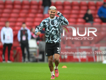 Bruno Guimaraes of Newcastle United warms up ahead of kick-off during the Premier League match between Nottingham Forest and Newcastle Unite...