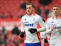 Chris Wood of Nottingham Forest warms up ahead of kick-off during the Premier League match between Nottingham Forest and Newcastle United at...