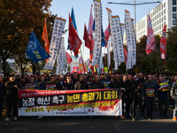 Hundreds of farmers march through the streets of Yeouido as part of the Farmers' General Rally for Agricultural Reform, organized by the Kor...