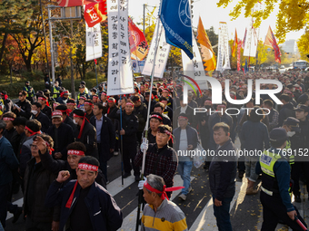 Hundreds of farmers march through the streets of Yeouido as part of the Farmers' General Rally for Agricultural Reform, organized by the Kor...