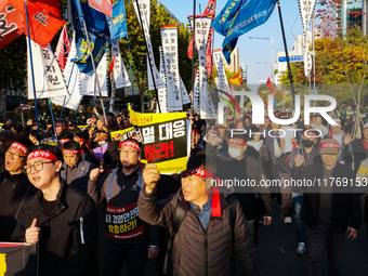 Hundreds of farmers march through the streets of Yeouido as part of the Farmers' General Rally for Agricultural Reform, organized by the Kor...