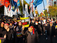 Hundreds of farmers march through the streets of Yeouido as part of the Farmers' General Rally for Agricultural Reform, organized by the Kor...