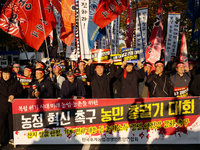 Hundreds of farmers march through the streets of Yeouido as part of the Farmers' General Rally for Agricultural Reform, organized by the Kor...