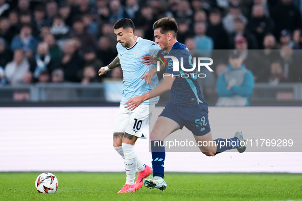 Mattia Zaccagni of SS Lazio and Martim Fernandes of FC Porto compete for the ball during the UEFA Europa League 2024/25 League Phase MD4 mat...