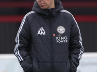 Amandine Miquel, manager of Leicester City, participates in the pre-match warm-up during the Barclays FA Women's Super League soccer match b...