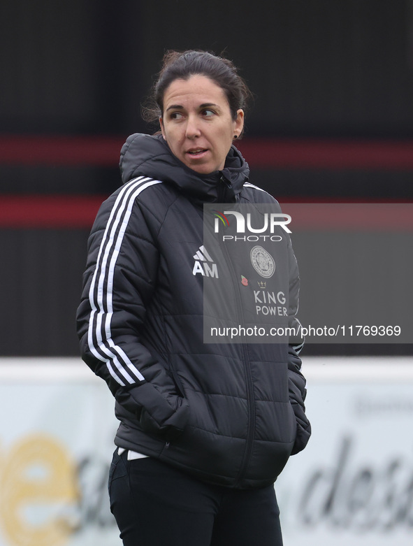 Amandine Miquel, manager of Leicester City, participates in the pre-match warm-up during the Barclays FA Women's Super League soccer match b...