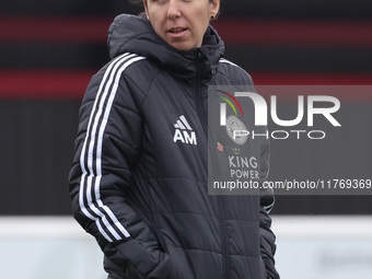 Amandine Miquel, manager of Leicester City, participates in the pre-match warm-up during the Barclays FA Women's Super League soccer match b...