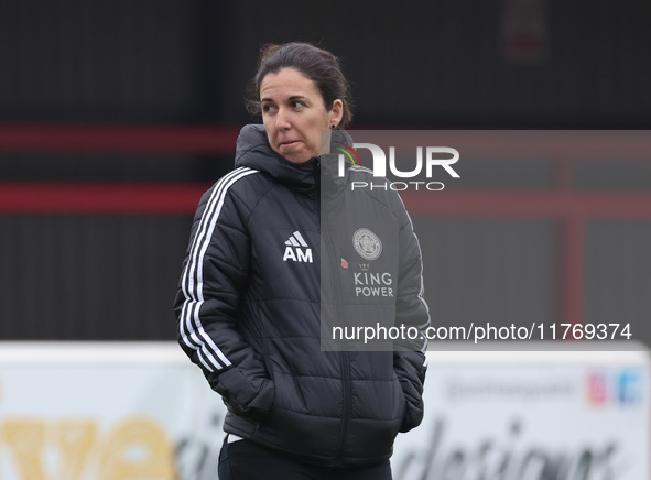 Amandine Miquel, manager of Leicester City, participates in the pre-match warm-up during the Barclays FA Women's Super League soccer match b...