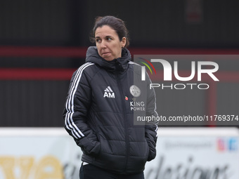 Amandine Miquel, manager of Leicester City, participates in the pre-match warm-up during the Barclays FA Women's Super League soccer match b...