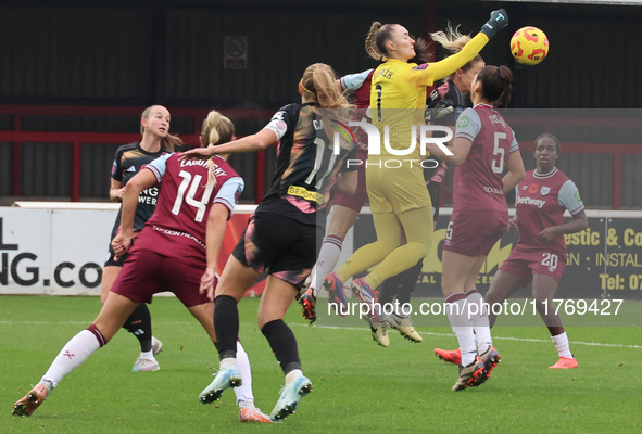 Kinga Szemik of West Ham United WFC (yellow) plays during the Barclays FA Women's Super League soccer match between West Ham United Women an...