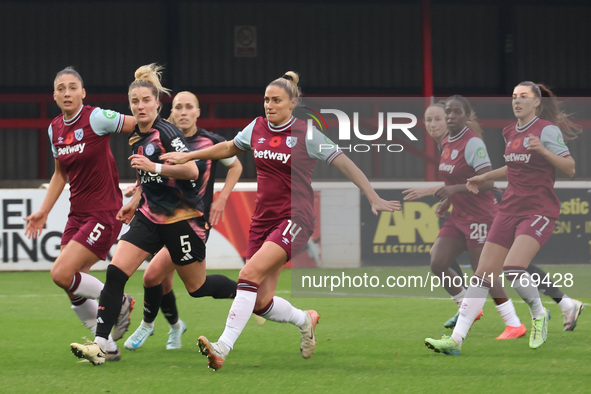 Amber Tysiak of West Ham United WFC, Sophie Howard of Leicester City Women, and Shelina Zadorsky of West Ham United WFC are in action during...