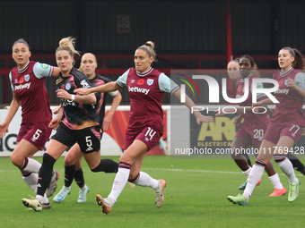 Amber Tysiak of West Ham United WFC, Sophie Howard of Leicester City Women, and Shelina Zadorsky of West Ham United WFC are in action during...