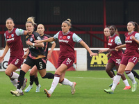 Amber Tysiak of West Ham United WFC, Sophie Howard of Leicester City Women, and Shelina Zadorsky of West Ham United WFC are in action during...