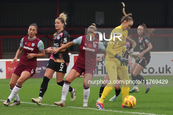 Kinga Szemik of West Ham United WFC (yellow) plays during the Barclays FA Women's Super League soccer match between West Ham United Women an...