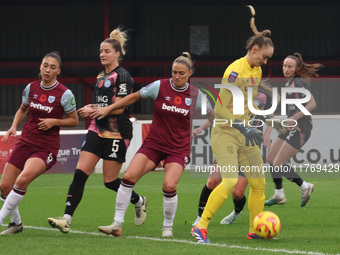 Kinga Szemik of West Ham United WFC (yellow) plays during the Barclays FA Women's Super League soccer match between West Ham United Women an...