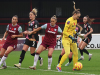 Kinga Szemik of West Ham United WFC (yellow) plays during the Barclays FA Women's Super League soccer match between West Ham United Women an...