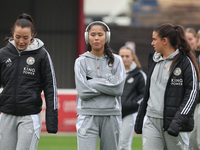 In Dagenham, England, on November 10, 2024, from left to right, Missy Goodwin of Leicester City, Asmita Ale, and Emila Pelgander of Leiceste...