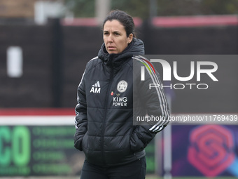 Amandine Miquel, manager of Leicester City, participates in the pre-match warm-up during the Barclays FA Women's Super League soccer match b...