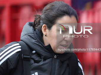 Amandine Miquel, manager of Leicester City, participates in the pre-match warm-up during the Barclays FA Women's Super League soccer match b...