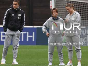 In Dagenham, England, on November 10, 2024, from left to right, Missy Goodwin, Yuka Momiki, and Emilia Pelgander of Leicester City Women par...