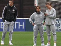 In Dagenham, England, on November 10, 2024, from left to right, Missy Goodwin, Yuka Momiki, and Emilia Pelgander of Leicester City Women par...