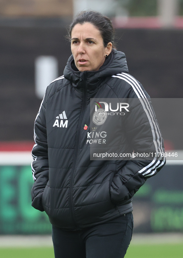 Amandine Miquel, manager of Leicester City, participates in the pre-match warm-up during the Barclays FA Women's Super League soccer match b...