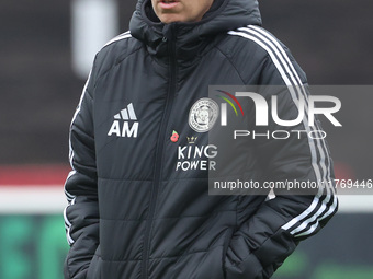 Amandine Miquel, manager of Leicester City, participates in the pre-match warm-up during the Barclays FA Women's Super League soccer match b...