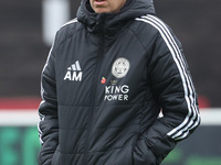 Amandine Miquel, manager of Leicester City, participates in the pre-match warm-up during the Barclays FA Women's Super League soccer match b...