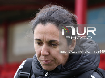 Amandine Miquel, manager of Leicester City, participates in the pre-match warm-up during the Barclays FA Women's Super League soccer match b...