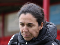 Amandine Miquel, manager of Leicester City, participates in the pre-match warm-up during the Barclays FA Women's Super League soccer match b...