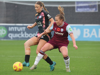 Ruby Mace of Leicester City Women and Oona Siren of West Ham United WFC are in action during the Barclays FA Women's Super League soccer mat...