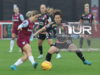 Katrina Gorry of West Ham United WFC and Yuka Momiki of Leicester City Women are in action during the Barclays FA Women's Super League socce...