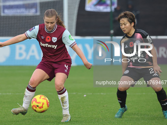 Oona Siren of West Ham United WFC and Yuka Momiki of Leicester City Women play during the Barclays FA Women's Super League soccer match betw...