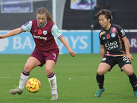 Oona Siren of West Ham United WFC and Yuka Momiki of Leicester City Women play during the Barclays FA Women's Super League soccer match betw...