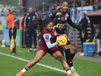 Manuela Pav of West Ham United WFC and Shana Chossenotte of Leicester City Women are in action during the Barclays FA Women's Super League s...