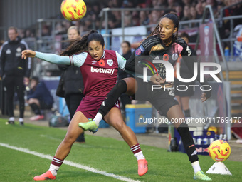 Manuela Pav of West Ham United WFC and Shana Chossenotte of Leicester City Women are in action during the Barclays FA Women's Super League s...