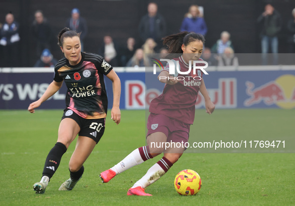 Missy Goodwin of Leicester City Women and Lime Mengwen, on loan from Brighton & Hove Albion, of West Ham United WFC play during the Barclays...