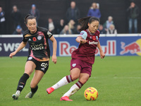 Missy Goodwin of Leicester City Women and Lime Mengwen, on loan from Brighton & Hove Albion, of West Ham United WFC play during the Barclays...