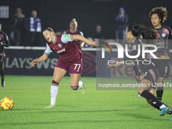 Seraina Piubel of West Ham United WFC and Saori Takarada of Leicester City Women are in action during the Barclays FA Women's Super League s...